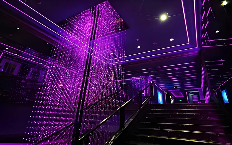 DMX controller connected to LED strips for synchronized lighting control